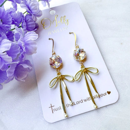 Blakely Earrings- Clear Stone W/Gold Bow Dangle